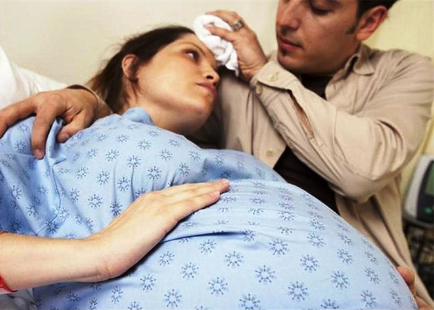 Husband Comforting Pregnant Wife